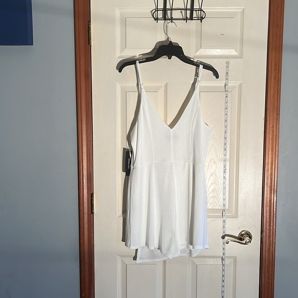 NWT-Bebe-XL-white-stretchy, adjustable straps, wrap skirt romper. Built in short - Picture 6 of 13